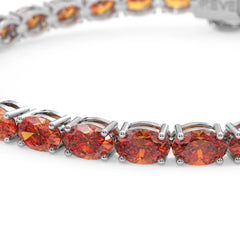 Bracelet de tennis ovale en saphir orange de laboratoire, monté sur vermeil en or blanc 18 carats