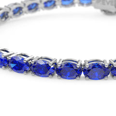 Ovales (6x4mm) Tennisarmband mit königsblauem Laborsaphir in 18K Weißgold-Vermeil