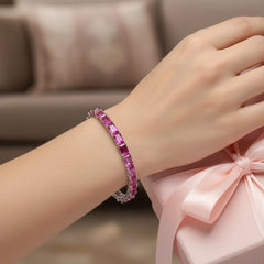 Bracelet de tennis en vermeil d'or blanc 18 carats et saphir rose de laboratoire taille émeraude