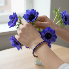 Tennisarmband mit smaragdgeschliffenem (6x4mm) königsblauem Laborsaphir in 18K Roségold-Vermeil