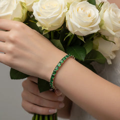 Tennisarmband mit smaragdgeschliffenem (6x4mm) kolumbianischem Labor-Smaragd in 18K Roségold-Vermeil