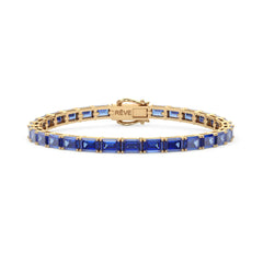 Tennisarmband mit smaragdgeschliffenem (6x4mm) kornblumenblauem Laborsaphir in 18 Karat Gelbgold-Vermeil