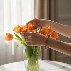 Tennisarmband mit smaragdgeschliffenem (6x4mm) orangefarbenem Laborsaphir in 18 Karat Gelbgold-Vermeil