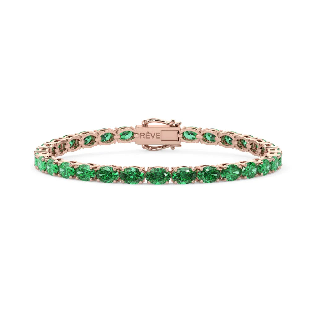 Bracelet de tennis ovale en émeraude de Colombie de laboratoire, monté sur vermeil en or rose 18 carats.