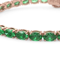Bracelet de tennis ovale en émeraude de Colombie de laboratoire, monté sur vermeil en or rose 18 carats.