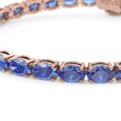 Bracelet de tennis ovale en saphir bleuet de laboratoire, monté sur vermeil en or rose 18 carats
