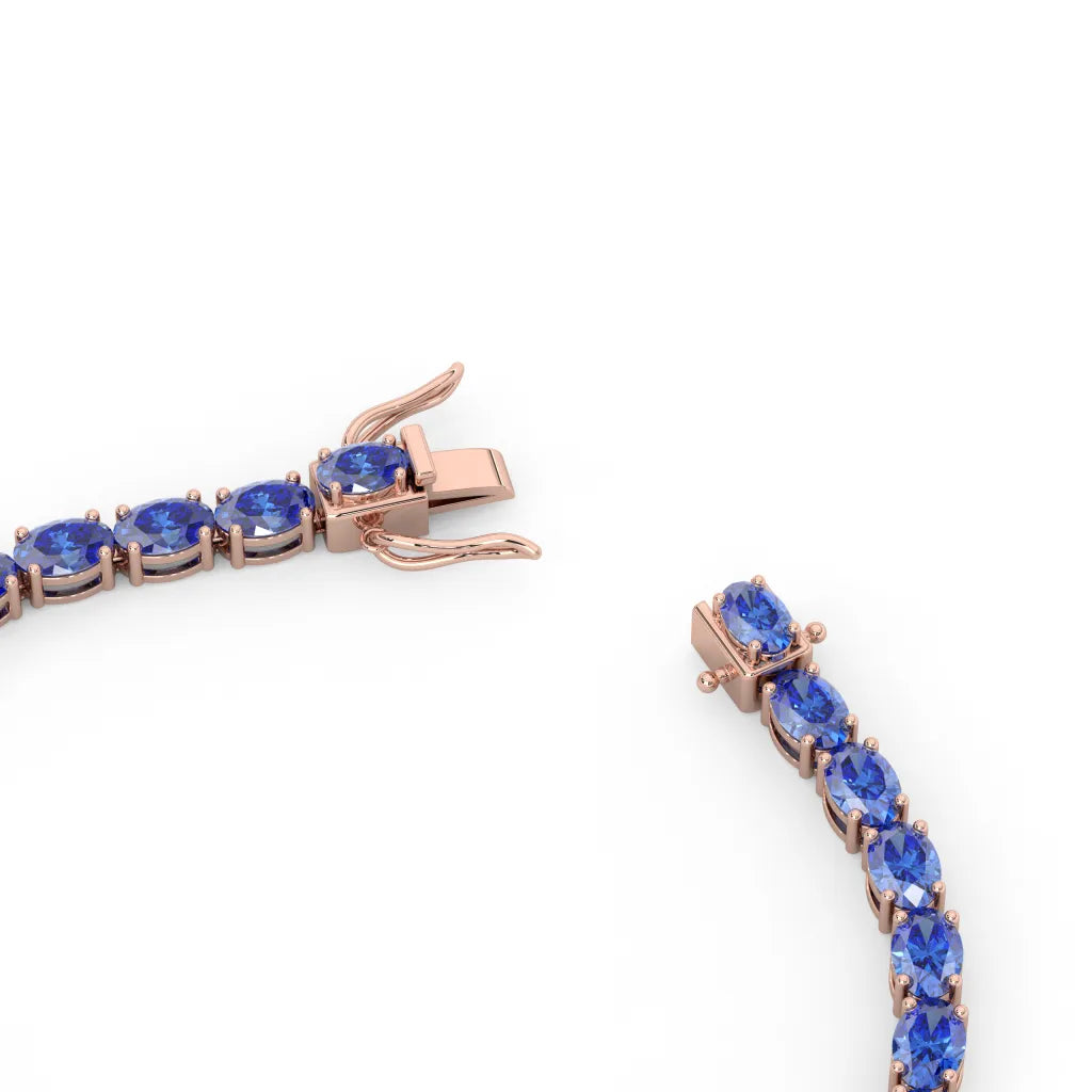 Bracelet de tennis ovale en saphir bleuet de laboratoire, monté sur vermeil en or rose 18 carats