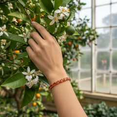 Bracelet de tennis ovale en saphir orange de laboratoire, monté sur vermeil en or rose 18 carats
