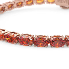 Bracelet de tennis ovale en saphir orange de laboratoire, monté sur vermeil en or rose 18 carats