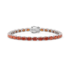 Bracelet de tennis ovale en saphir orange de laboratoire, monté sur vermeil en or blanc 18 carats