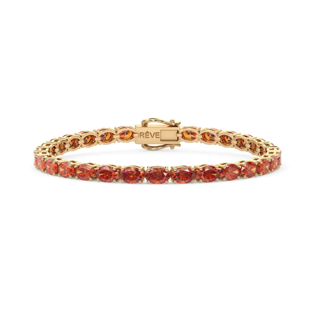 Bracelet de tennis ovale en saphir orange de laboratoire, monté sur vermeil en or jaune 18 carats