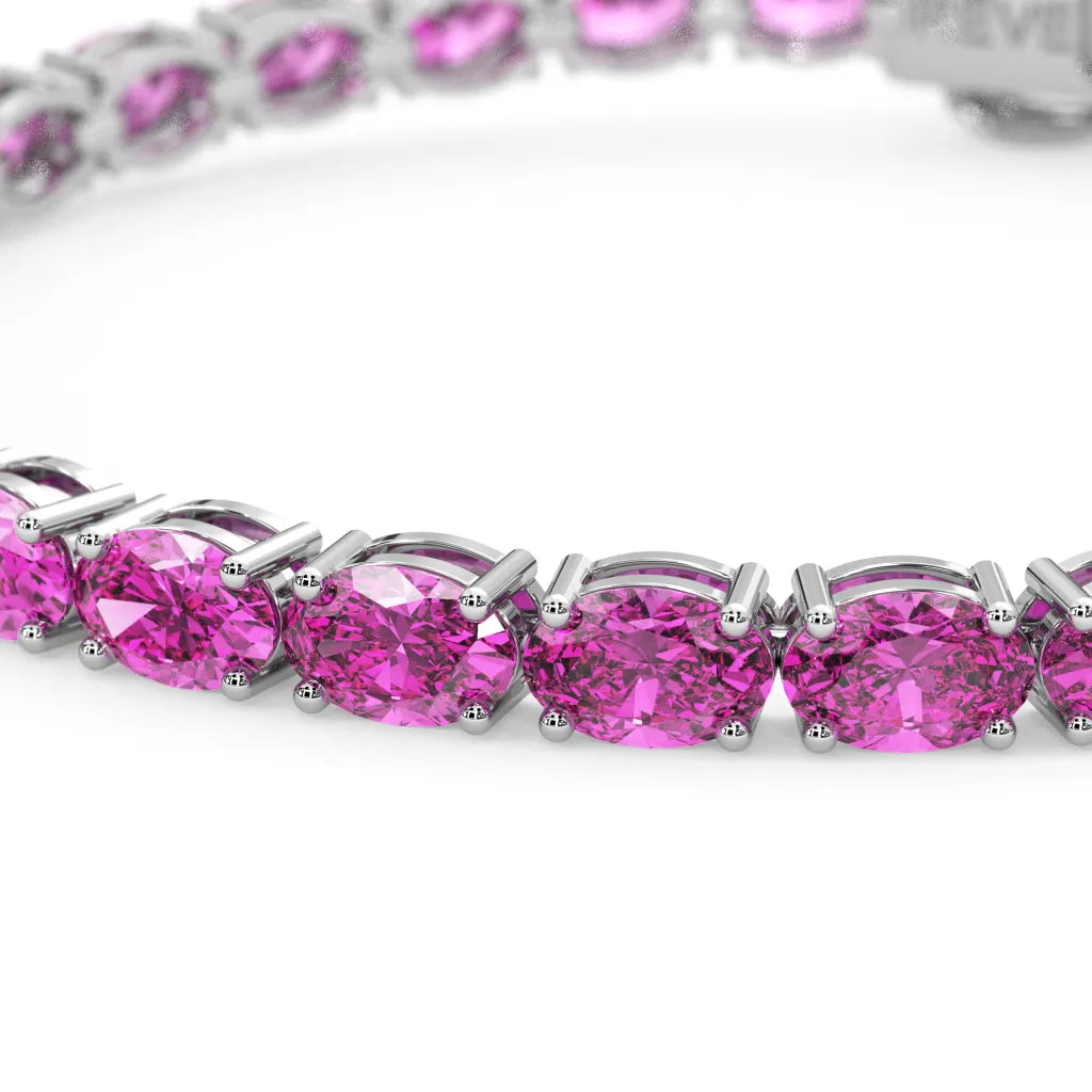 Bracelet de tennis ovale en saphir rose de laboratoire, monté sur vermeil en or blanc 18 carats