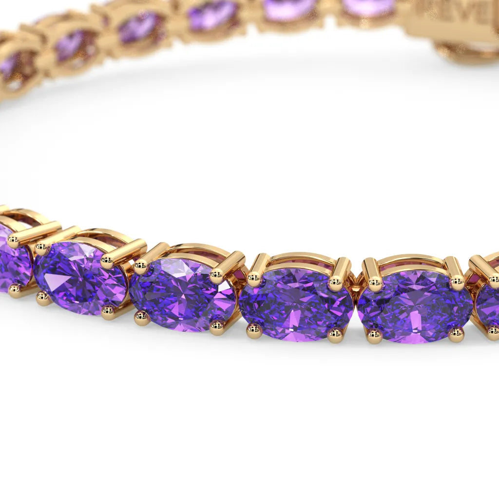 Ovales (6x4mm) Tennisarmband mit laborgeprüftem violettem Saphir in 18 Karat Gelbgold-Vermeil