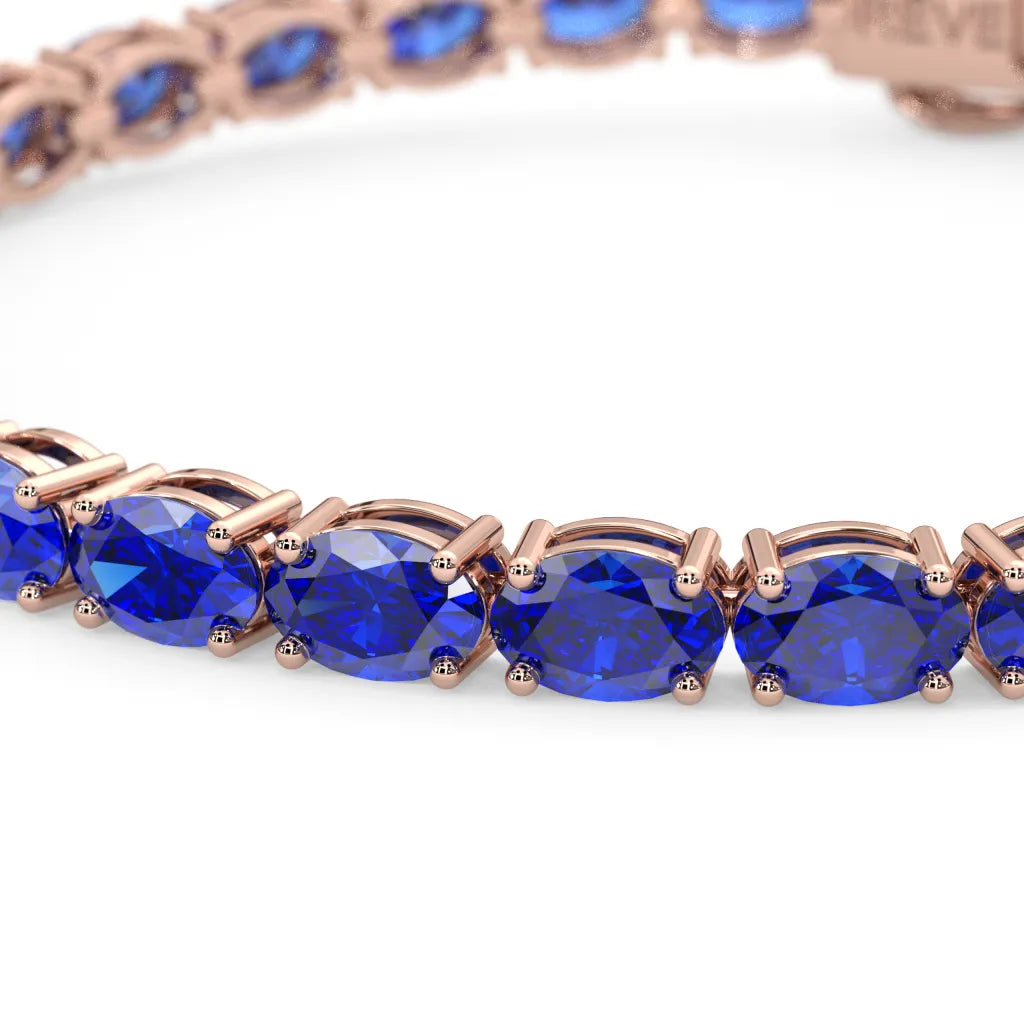 Bracelet de tennis ovale en saphir bleu royal de laboratoire, monté sur vermeil en or rose 18 carats