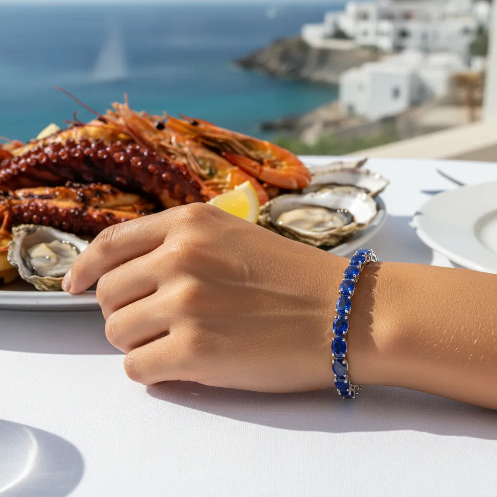 Ovales (6x4mm) Tennisarmband mit königsblauem Laborsaphir in 18K Weißgold-Vermeil