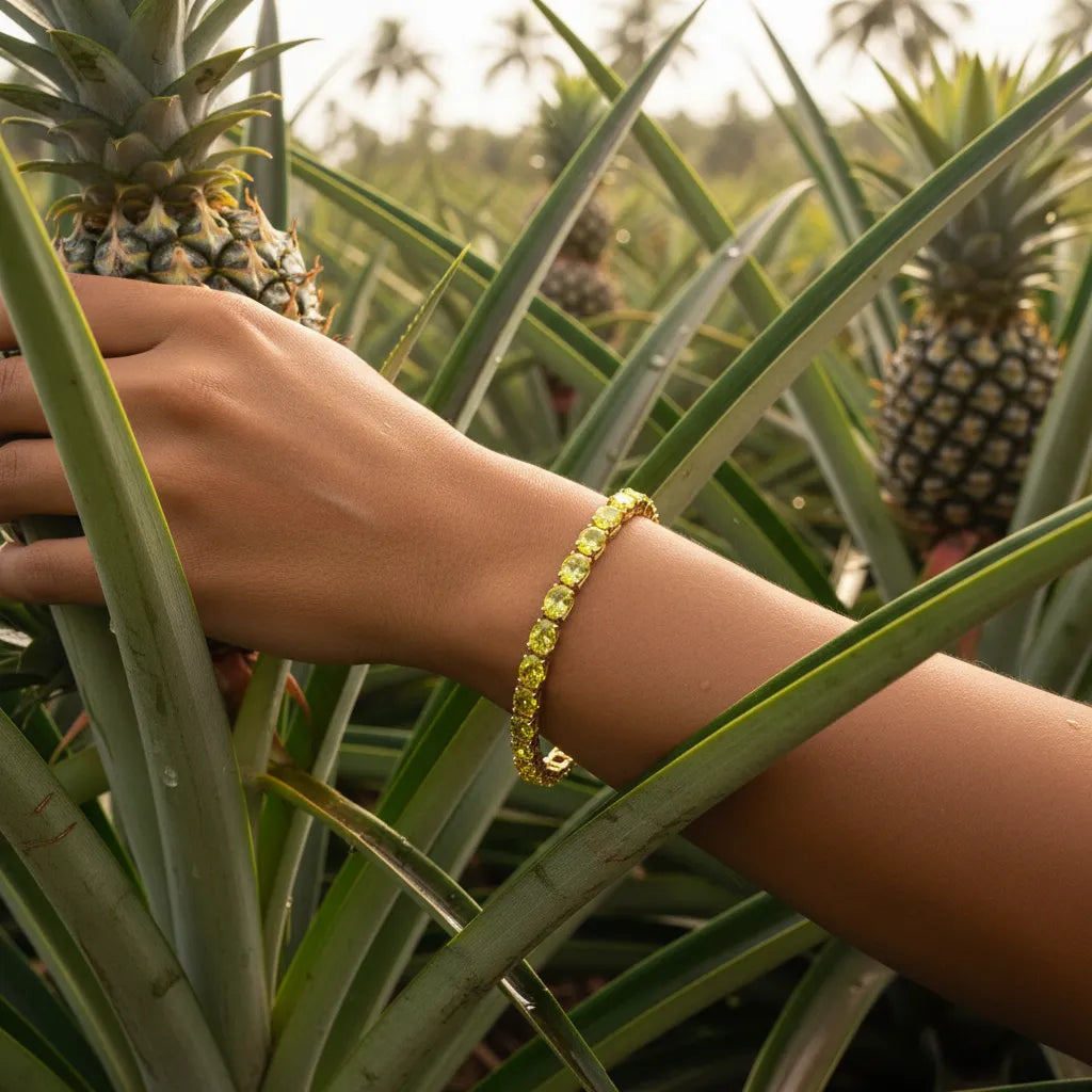 Ovales (6x4mm) Tennisarmband mit gelbem Laborsaphir in 18K Gelbgold-Vermeil