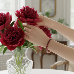 Tennisarmband mit smaragdgeschliffenem (6x4mm) Labor-Taubenblutrubin in 18K Roségold-Vermeil