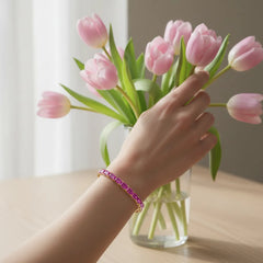 Tennisarmband mit smaragdgeschliffenem (6x4mm) rosa Laborsaphir in 18K Gelbgold-Vermeil