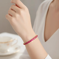 Bracelet de tennis en vermeil d'or jaune 18 carats, orné d'un rubis rose rouge de laboratoire rond de 14,7 ct.