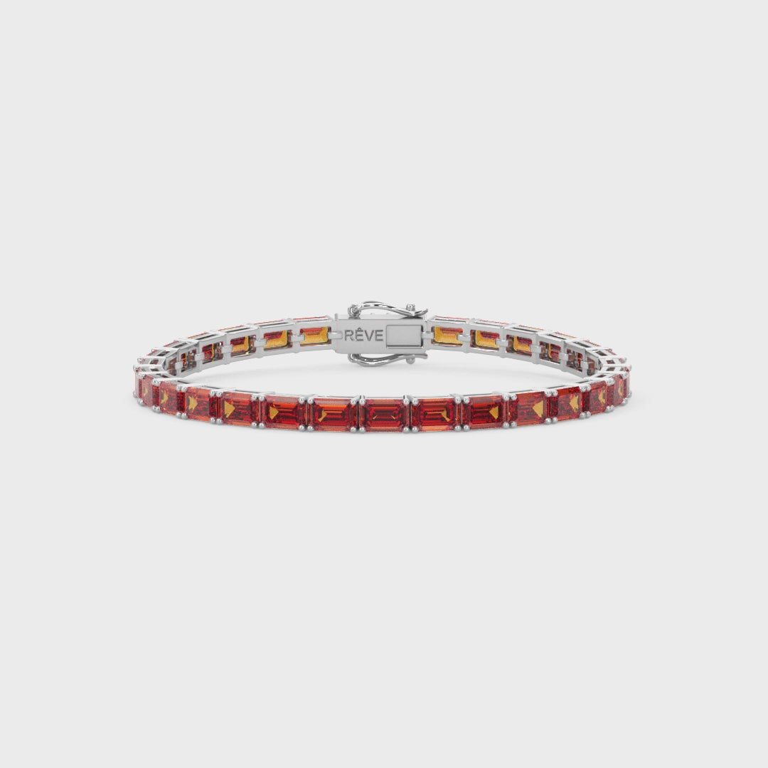 Bracelet de tennis en vermeil d'or blanc 18 carats et saphir orange de laboratoire taille émeraude