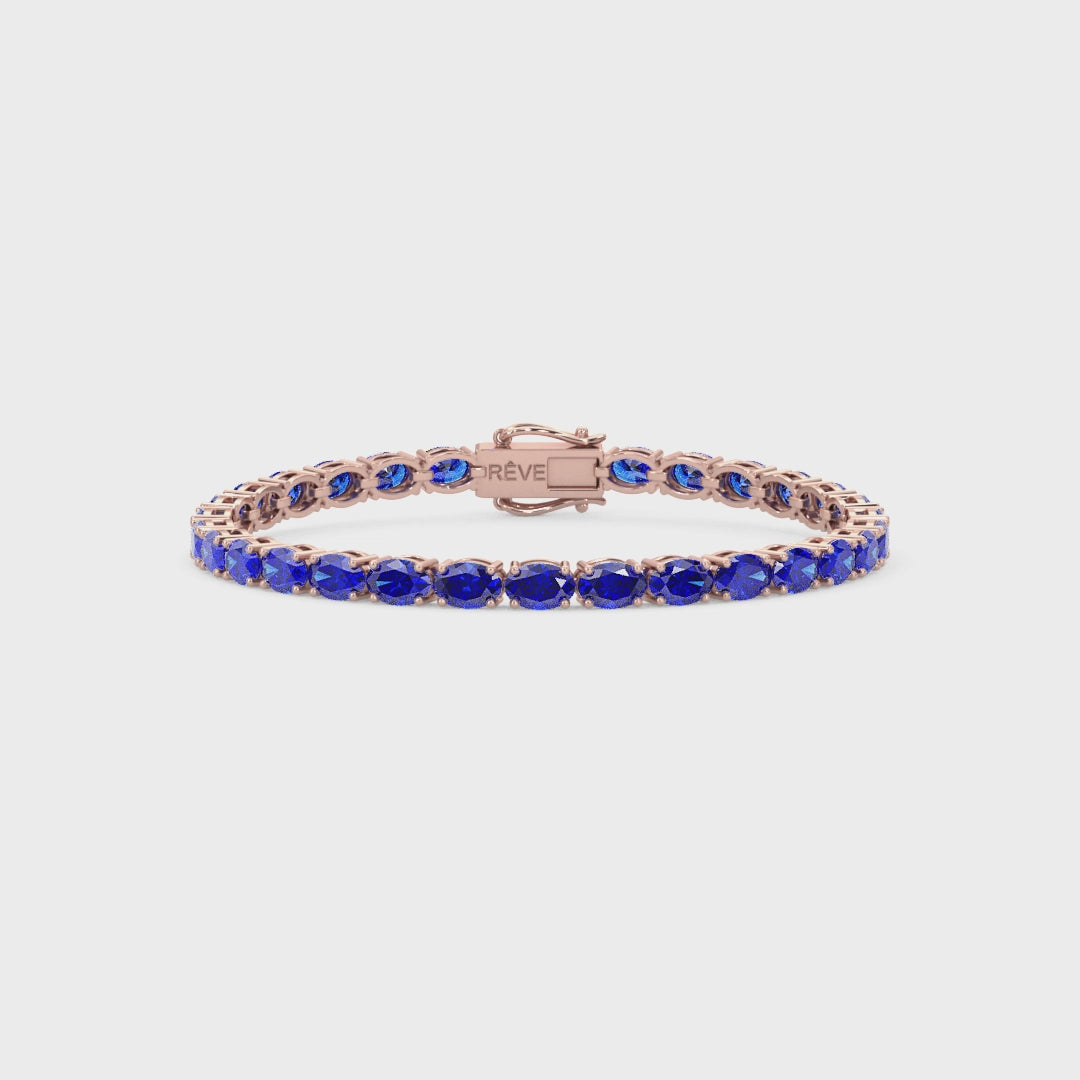 Bracelet de tennis ovale en saphir bleu royal de laboratoire, monté sur vermeil en or rose 18 carats