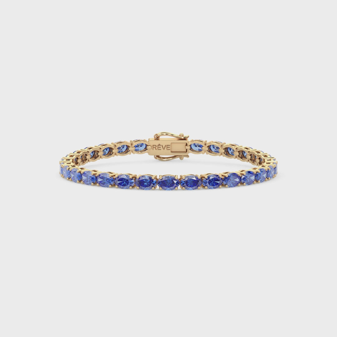 Ovales (6x4mm) Tennisarmband mit laborgeprüftem kornblumenblauem Saphir in 18 Karat Gelbgold-Vermeil