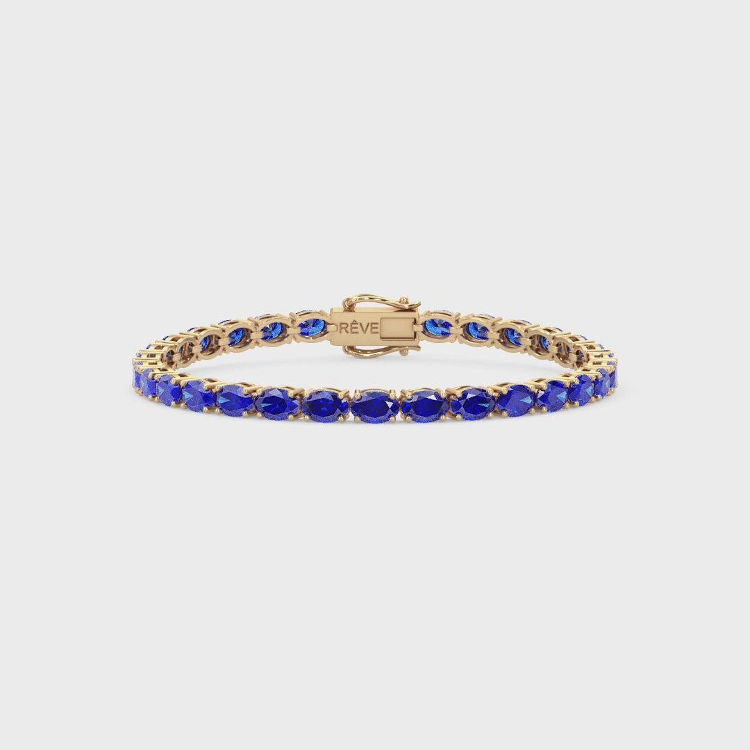 Bracelet de tennis ovale en saphir bleu royal de laboratoire, monté sur vermeil en or jaune 18 carats